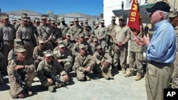 US Defense Secretary Robert Gates speaks to Marines while visiting the 3rd Battalion, 5th Marine Regiment at Forward Operating Base Sabit Qadam in Helmand province, Afghanistan, March 8, 2011 (file photo)