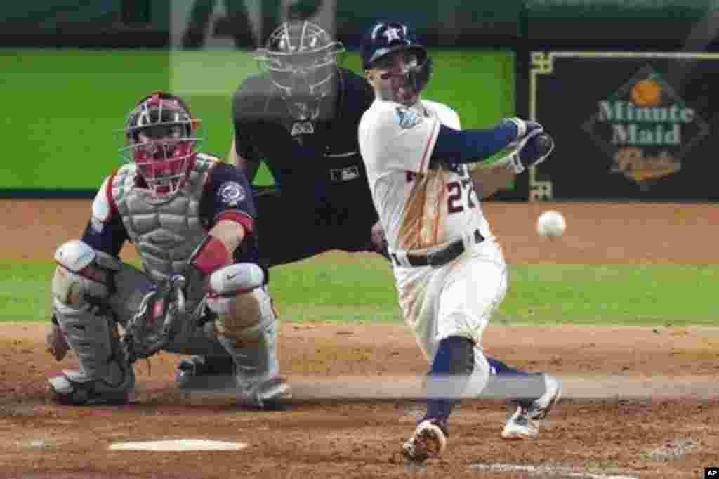 Ni los aportunos hits del venezolano José Altuve pudieron hacer avanzar a los Astros en una humillante derrota 12-3 frente a los Nats. AP.