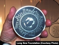 The Rosetta Disk fits in the palm of your hand, yet it contains over 13,000 pages of information on over 1,500 human languages. The design shows headlines in the eight major languages of the world today.