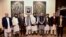 Pakistan's Foreign Minister Shah Mahmood Qureshi, fourth right, and other top officials pose for photograph with Taliban Foreign Minister Amir Khan Muttaqi and his delegation prior to their meeting, in Islamabad, Nov. 11, 2021. (Pakistan Ministry of Foreign Affairs via AP)