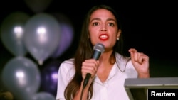 Democratic congressional candidate Alexandria Ocasio-Cortez speaks at her midterm election night party in New York City, Nov. 6, 2018.