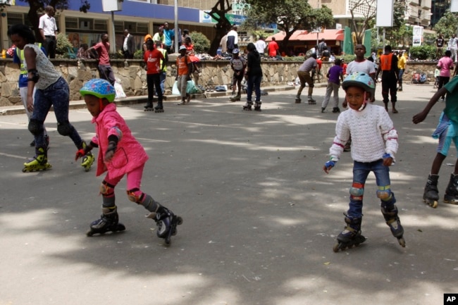 Roller skating is a fun activity to do with family and friends. In this 2015 photo, children and adults skate together in downtown Nairobi , Kenya. (AP Photo)