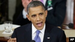 President Barack Obama gestures as he gives his State of the Union address during a joint session of Congress on Capitol Hill in Washington, Feb. 12, 2013