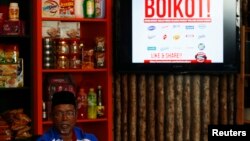 Bazeer Ahmed, a member of Malaysian Muslim Wholesalers and Retailers Association (MAWAR), a non-governmental organization, speaks to journalists during news conference on stopping the supply of Cadbury chocolate products to retail shops in Kuala Lumpur, May 29, 2014. 