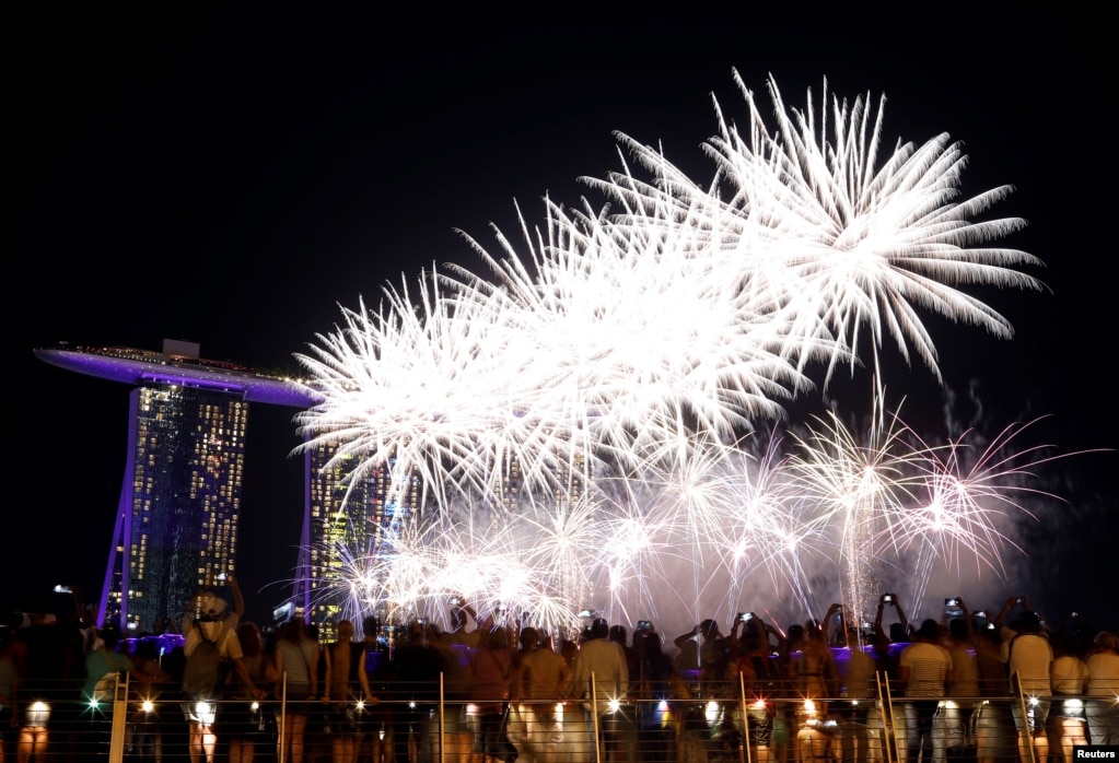 Fireworks explode over the Marina Bay ahead of the New Year&#39;s Eve festivities in Singapore, Dec. 31, 2018.