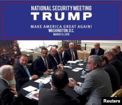 George Papadopoulos (3rd L) appears in a photograph released on Donald Trump's social media accounts with a headline stating that the scene was of his campaign's national security meeting in Washington, D.C., on March 31, 2016 and published April 1, 2016.
