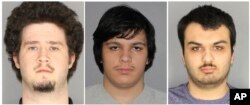 This combination of three Jan. 22, 2019, photos released by the Greece, N.Y., Police Department shows from left, Brian Colaneri, Andrew Crysel and Vincent Vetromile. Authorities said the three men, along with a 16-year old, were charged with plotting to attack a rural upstate New York Muslim community.