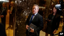 FILE - Incoming White House press secretary, at the time RNC communications director and chief strategist, Sean Spicer arrives at Trump Tower, Nov. 14, 2016, in New York. Playing down previous statements by Donald Trump, Spicer says the president-elect will share his conclusions, not offer new revelations about election interference.