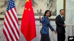2014年9月8日,美國總統國家安全事務助理蘇珊·賴斯與中國國務委員楊潔篪.