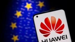 FILE - A smartphone with a Huawei logo is seen in front of an EU flag in this illustration taken Sept. 28, 2021.