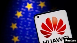 FILE - A smartphone with a Huawei logo is seen in front of an EU flag in this illustration taken Sept. 28, 2021.