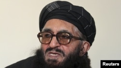 Former Taliban minister Maulvi Arsala Rahmani, a member of the High Peace Council, speaks during an interview in Kabul, Afghanistan, January 26, 2012.