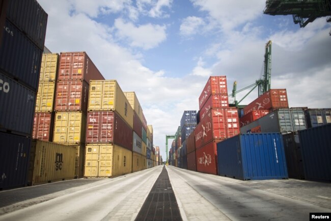 FILE - Containers line the Mariel port near Havana, Cuba. U.S. export industries could benefit from access to shipping lanes and ports, the Engage Cuba coalition said in 2015. It's pressing for stronger U.S.-Cuba connections.