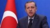 Turkish PM Urges Libyan Leader to Step Down
