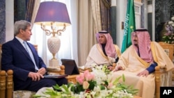 In this handout image provided by the state owned Saudi Press Agency, U.S. Secretary of State John Kerry, left, meets with Saudi King Salman right, in what likely will be his last visit as America’s top diplomat, Dec. 18, 2016