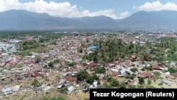 Uharibifu uliyoletwa na tetemeko la ardhi na wimbi kubwa la tsunami huko Palu, Jimbo la Sulawesi la kati, Indonesia, Septemba 30, 2018.