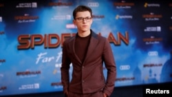 FILE: Actor Tom Holland poses at the World Premiere of Marvel Studios' "Spiderman: Far From Home" in Los Angeles, California, on June 26, 2019. 