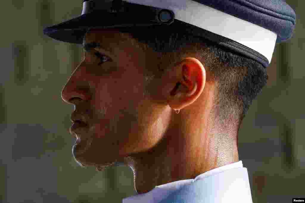 A member of the Pakistan Air Force (PAF) stands guard at the mausoleum of Muhammad Ali Jinnah during the Defense Day ceremonies, or Pakistan's Memorial Day, in Karachi.