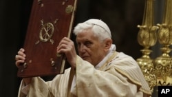 Pope Benedict celebrates the Christmas Eve Mass in St. Peter's Basilica at the Vatican, December 24, 2012