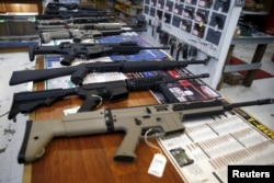 Guns for sale are displayed in the Roseburg Gun Shop in Roseburg, Oregon, Oct. 3, 2015.