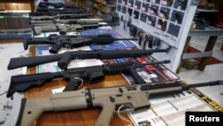 FILE - Guns for sale are displayed in the Roseburg Gun Shop in Roseburg, Oregon, Oct. 3, 2015.