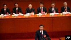 Chinese President Xi Jinping delivers a speech during the opening session of China's 19th Party Congress at the Great Hall of the People in Beijing.