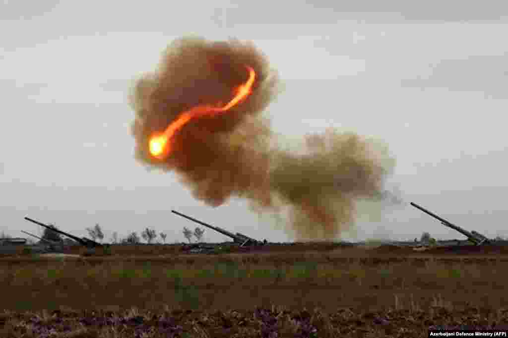 An image grab taken from a video made available on the official web site of the Azerbaijani Defence Ministry, allegedly shows Azeri artillery strike towards the positions of Armenian separatists in the breakaway region of Nagorno-Karabakh.