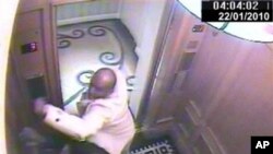 In this CCTV handout image issued by the Metropolitan Police, Saudi Arabian Prince Saud, in white jacket, attacks his servant, Bandar Abdulaziz, in a lift, 22 Jan 2010