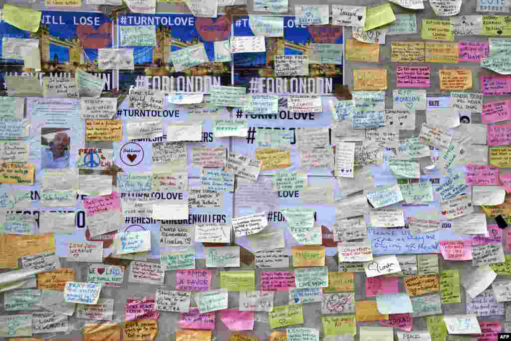 Messages left by well-wishers are seen on a wall on London bridge in London, following the June 3 terror attack that targeted members of the public on London Bridge and Borough Market.