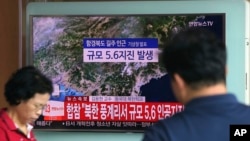 FILE - A man watches a TV reporting on a possible nuclear test conducted by North Korea at the Seoul Railway station in Seoul, South Korea, Sept. 3, 2017. North Korea is searching for support amid unprecedented pressure from the United States and the international community to cease its nuclear weapons and missile programs. 