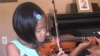 Children Learn to Play Music by Listening in Suzuki Method