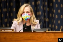 FILE - Rep. Abigail Spanberger, D-Va., speaks on Capitol Hill, March 10, 2021.