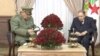 FILE - Algeria's President Abdelaziz Bouteflika, right, meets with Army Chief of Staff Lieutenant General Ahmed Gaid Salah in Algiers, Algeria, in this handout still image taken from a TV footage released on March 11, 2019. 