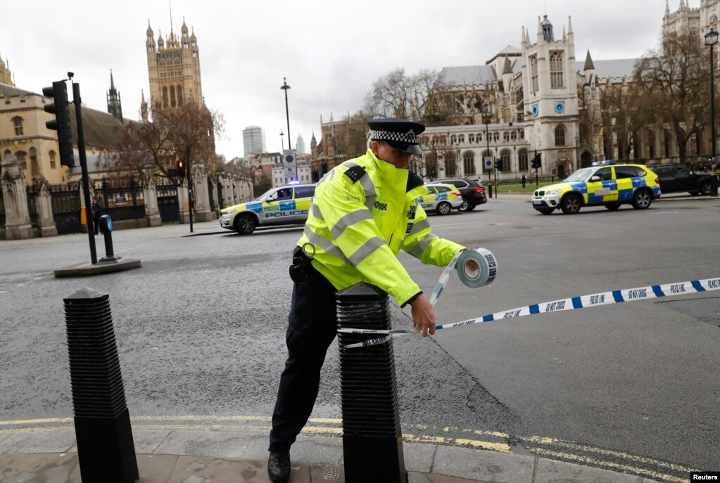 Police tapes off Parliament Square after reports of loud bangs, in London, Britain, March 22, 2017. 