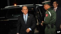 FILE - Burmese president Thein Sein prepares to leave for a state visit to the U.S., at Rangoon International airport, Burma, May 17, 2013.