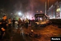 Emergency services work at the explosion site in Ankara, Turkey, March 13, 2016.
