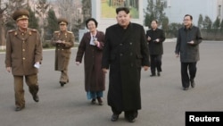 North Korean leader Kim Jong Un (C) visits the Phyongchon Revolutionary Site, in this undated photo released by North Korea's Korean Central News Agency (KCNA) in Pyongyang, Dec. 10, 2015.