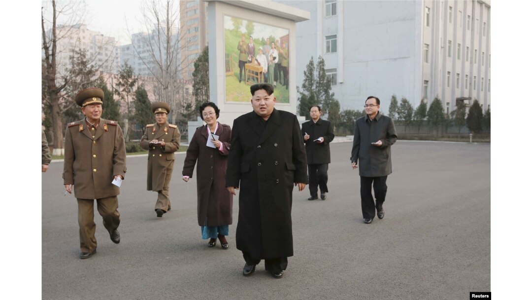 North Korean leader Kim Jong Un, center, visits the Phyongchon Revolutionary Site, in this undated photo released by North Korea's Korean Central News Agency (KCNA) in Pyongyang, Dec. 10, 2015.