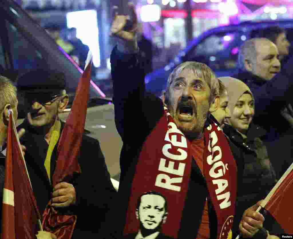 Crowd gather to welcome the Turkish Family Minister Fatma Betul Sayan Kaya, who decided to travel to Rotterdam by land after Turkish Foreign Minister Mevlut Cavusoglu's flight was barred from landing by the Dutch government, in Rotterdam, Netherlands, Mar