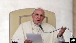 FILE - Pope Francis delivers a speech during a general audience in St. Peter's Square, at the Vatican, Aug. 31, 2016. In an apostolic letter published Monday Pope Francis has extended indefinitely to all Roman Catholic priests the power to forgive abortion.