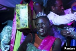 Mahad, who identifies as a transgender woman, smiles moments after being crowned as the winner of the Miss Pride beauty contest at an undisclosed venue in Kampala, Uganda, Aug. 7, 2015.