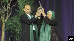 Iranian opposition activist Akbar Ganji accepts the Milton Friedman Award for Advancing Liberty