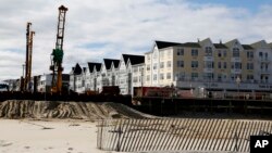 Work continues on a new section of the Pier Village development in Long Branch, New Jersey, March 5, 2018. The federal government has been advising a beach town on the Jersey Shore on plans to build a pier and start a ferry service that would speed New Yorkers to the doorstep of a resort co-owned by Jared Kushner.