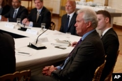 GE CEO Jeff Immelt listens during the "American Leadership in Emerging Technology" event with President Donald Trump in the East Room of the White House, June 22, 2017, in Washington.