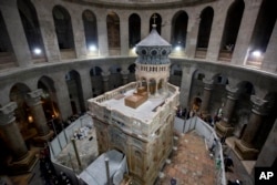 The renovated Edicule is seen in the Church of the Holy Sepulchre, traditionally believed to be the site of the crucifixion of Jesus Christ, in Jerusalem's old city Monday, Mar. 20, 2017.