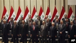The new Iraqi government is seen during a swearing in ceremony in Baghdad, Iraq, Tuesday, Dec. 21, 2010.