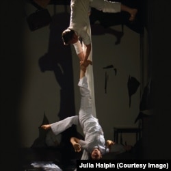 Only Child Aerial Theatre's Sloan Bradford (top) and co-founder Nicki Miller perform on aerial silks in ASYLUM.