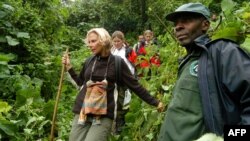 FILE - Dominique Bavukahe-Manir, chief inspector of the Jomba area at the National Park of Virunga in the DRC accompanies tourists to observe gorillas.