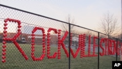 Plastic cups spell out Rockville Strong, at Rockville High School in Rockville, Maryland, March 23, 2017. The school has been thrust into the national immigration debate over an alleged rape.