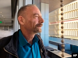 Timothy Ray Brown, shown in Seattle March 4, 2019, is also known as the "Berlin patient," the first person to be cured of HIV infection, more than a decade ago. Now researchers are reporting a second patient has lived 18 months after stopping HIV treatmen